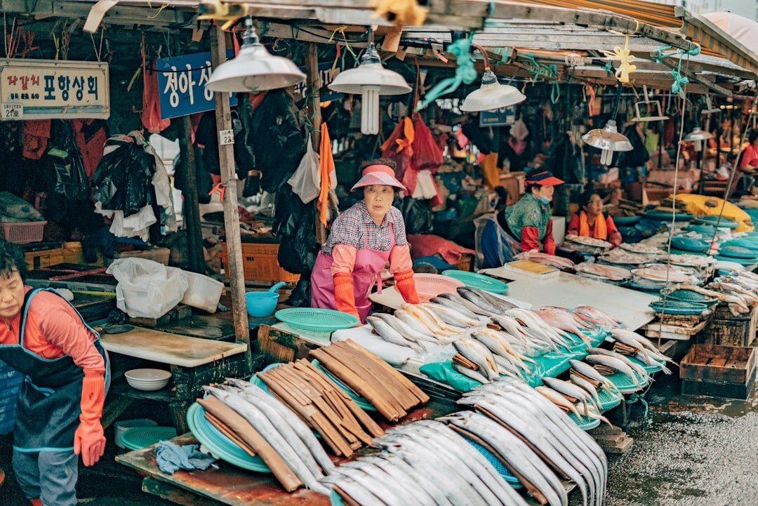 Portrait of a Danish market vendor woman at her stall
