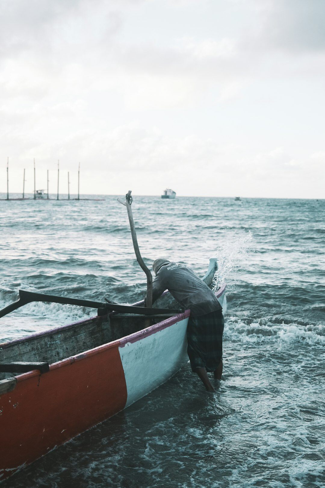 fisherman on boat at sea