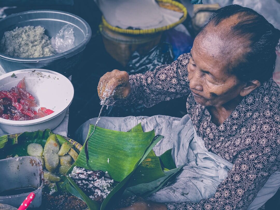 elderly woman cooking