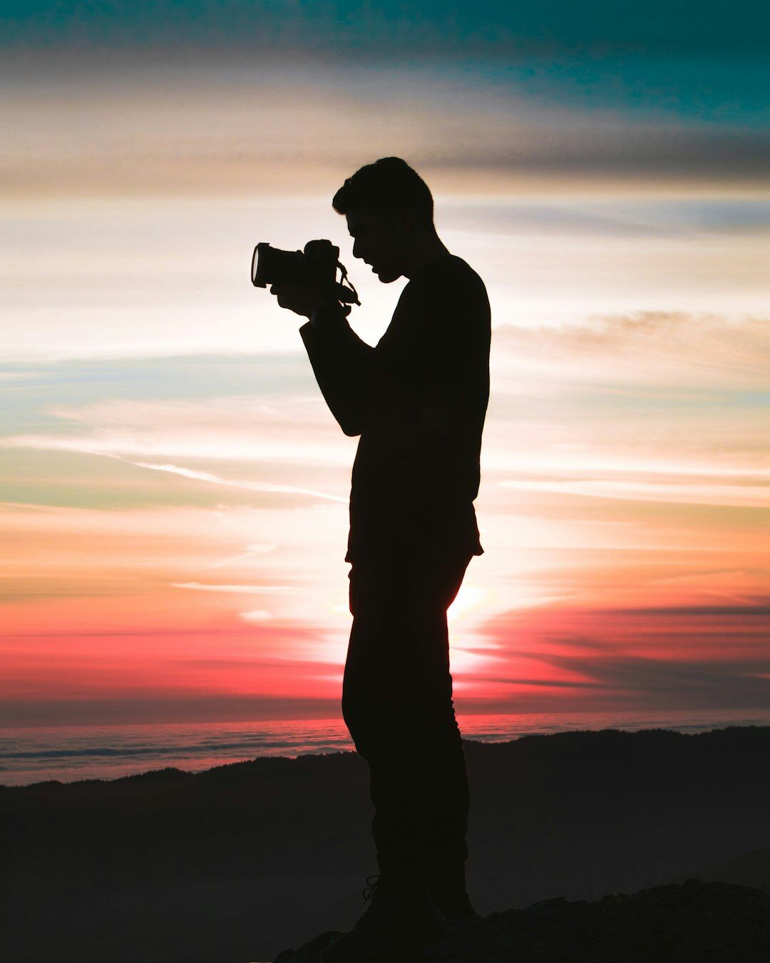 photographer taking pictures of youth