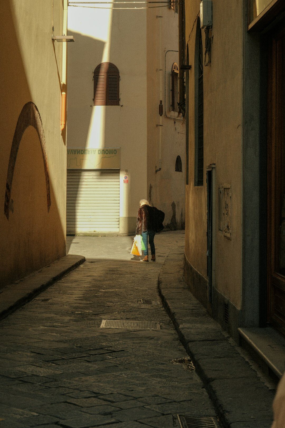 elderly man in old neighborhood