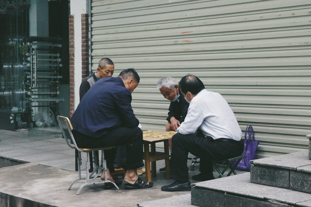 group of elderly men talking
